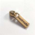 No5 Rectangular Zipper Pulls With Handmade Logo on- comes in 4 colours