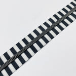 Humbug - Gun Metal teeth- No5 Zipper tape comes as 1-1/2 metre Packs